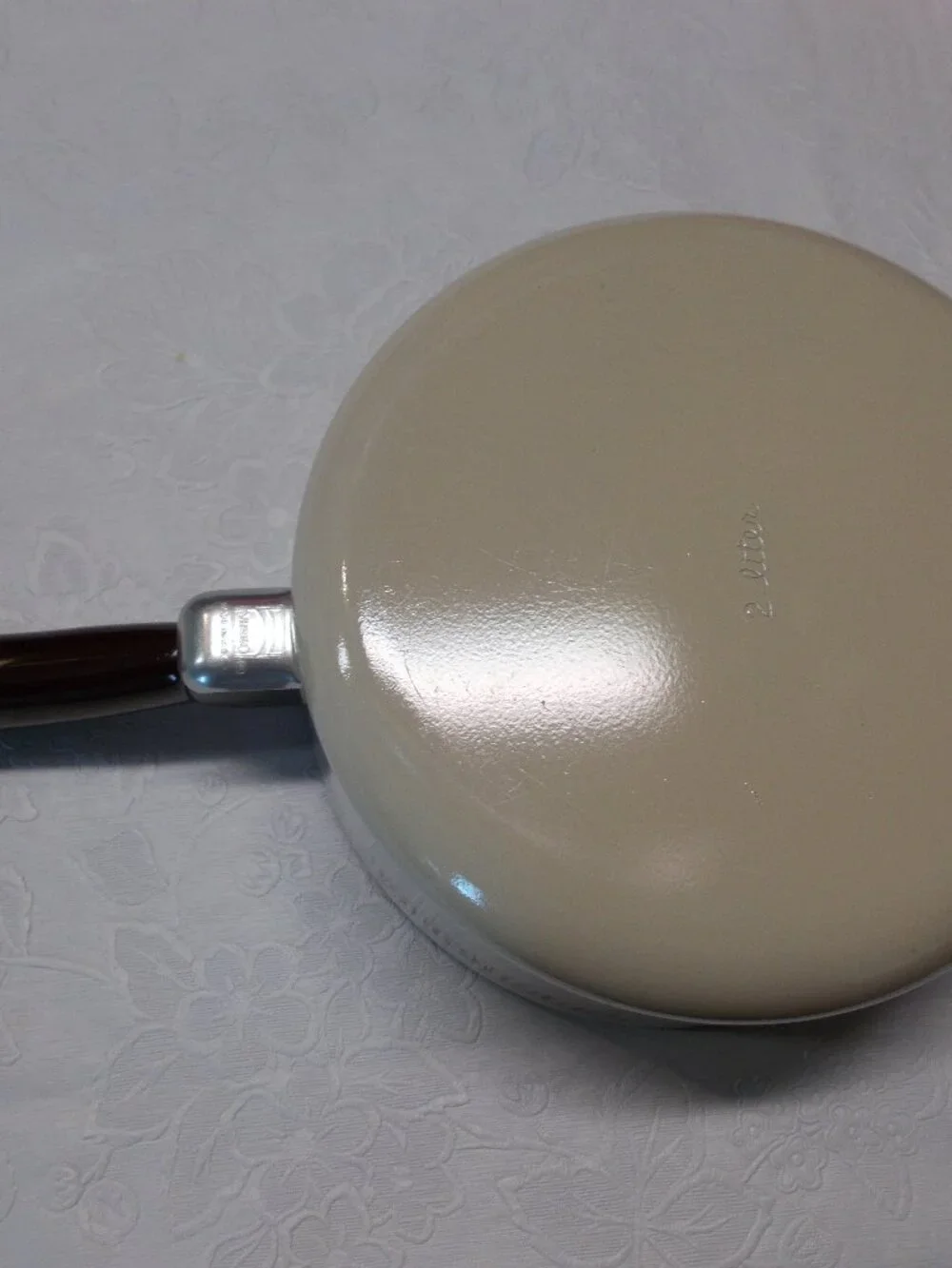 Mirro two liter saucepan and lid, almond and brown colors